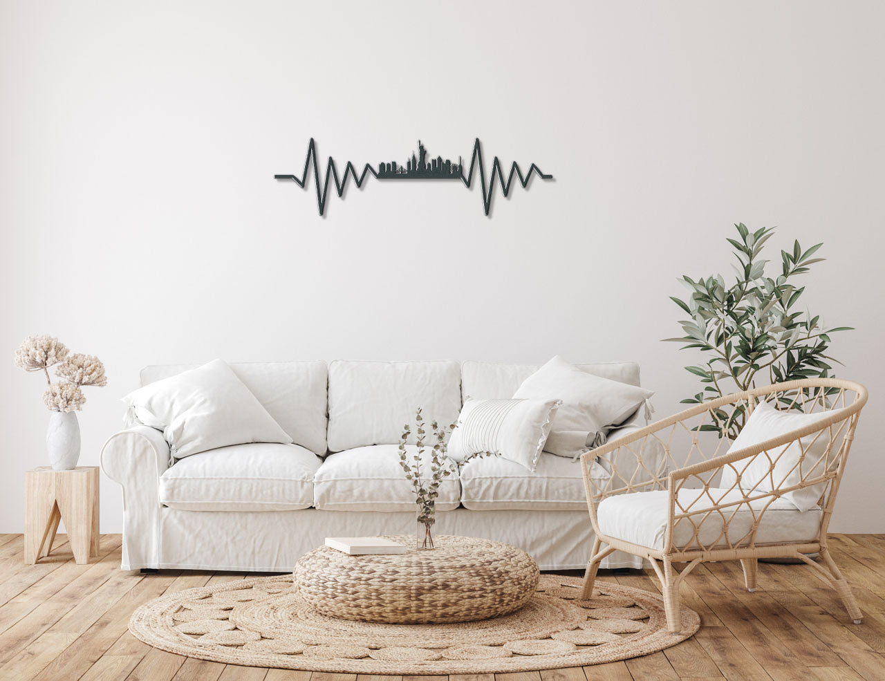 a living room with a white couch and a white chair