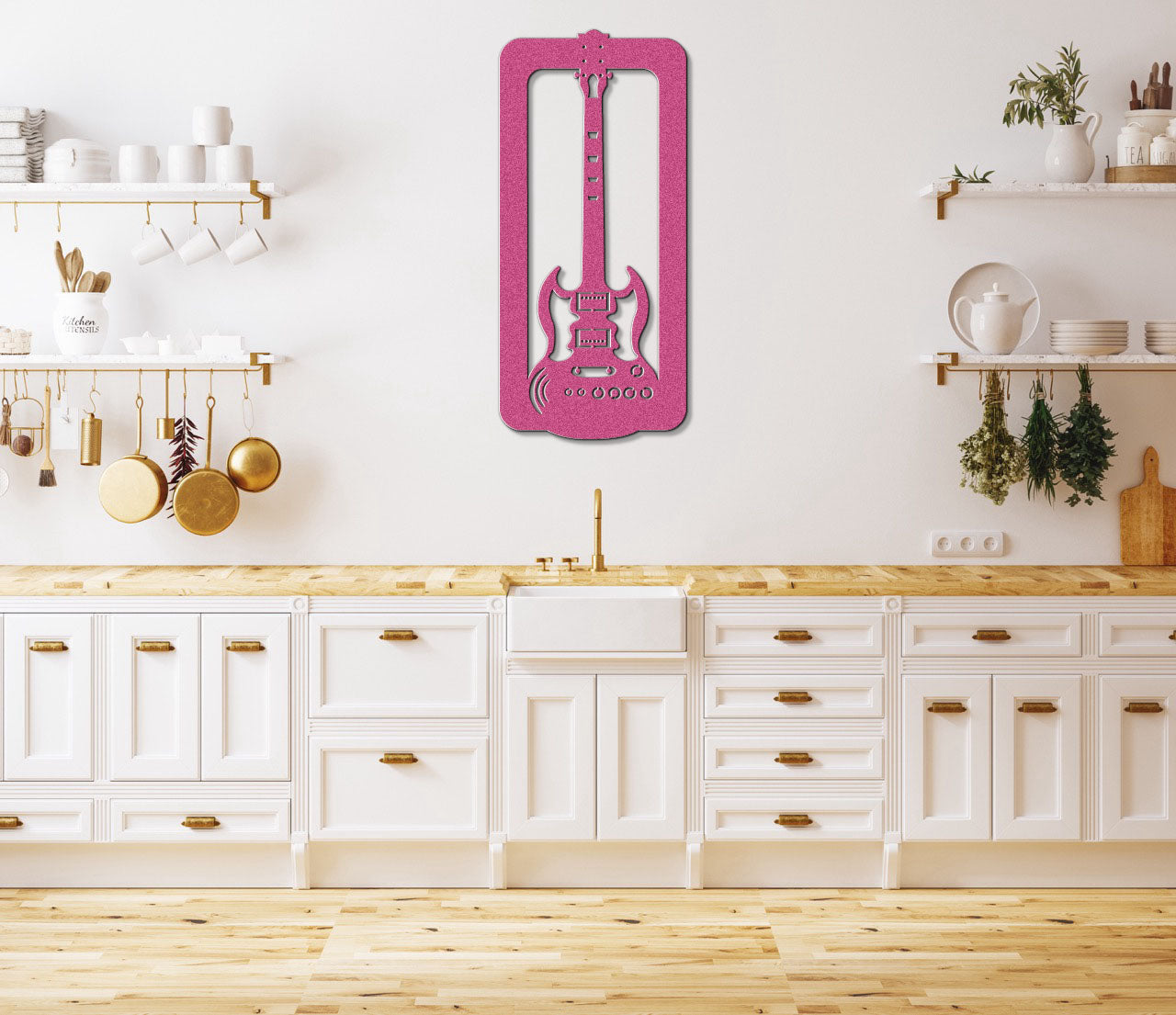 a kitchen with white cabinets and a pink clock