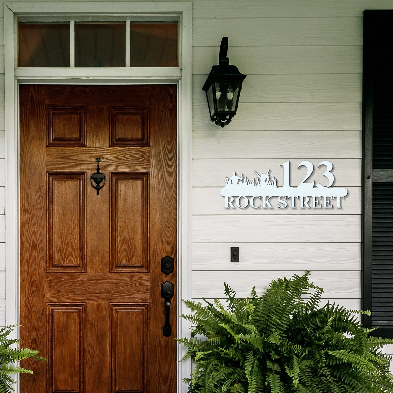 a wooden door with a light on the side of it