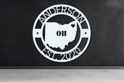 a black and white photo of a wall with a sign that says anderson oh