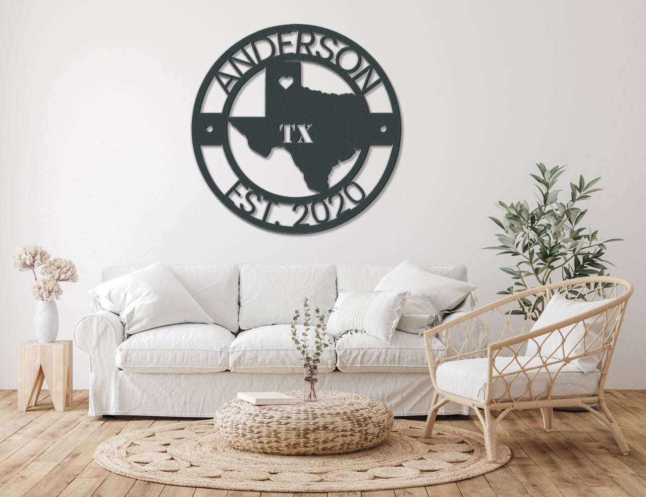 a living room with a white couch and white chairs