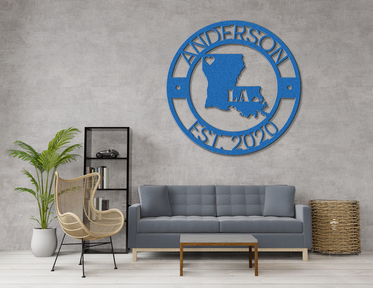 a living room with a gray couch and a blue sign