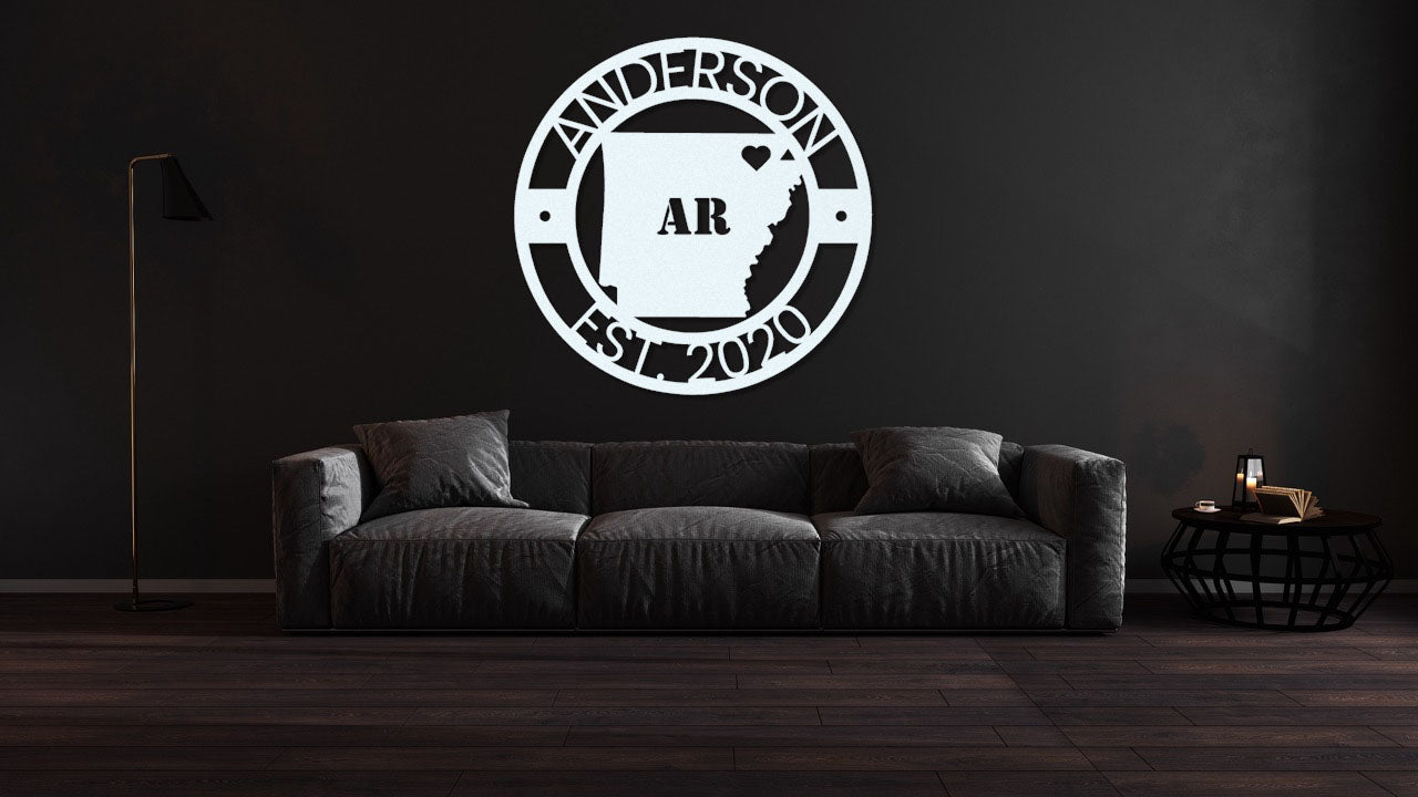 a living room with a couch and a black wall