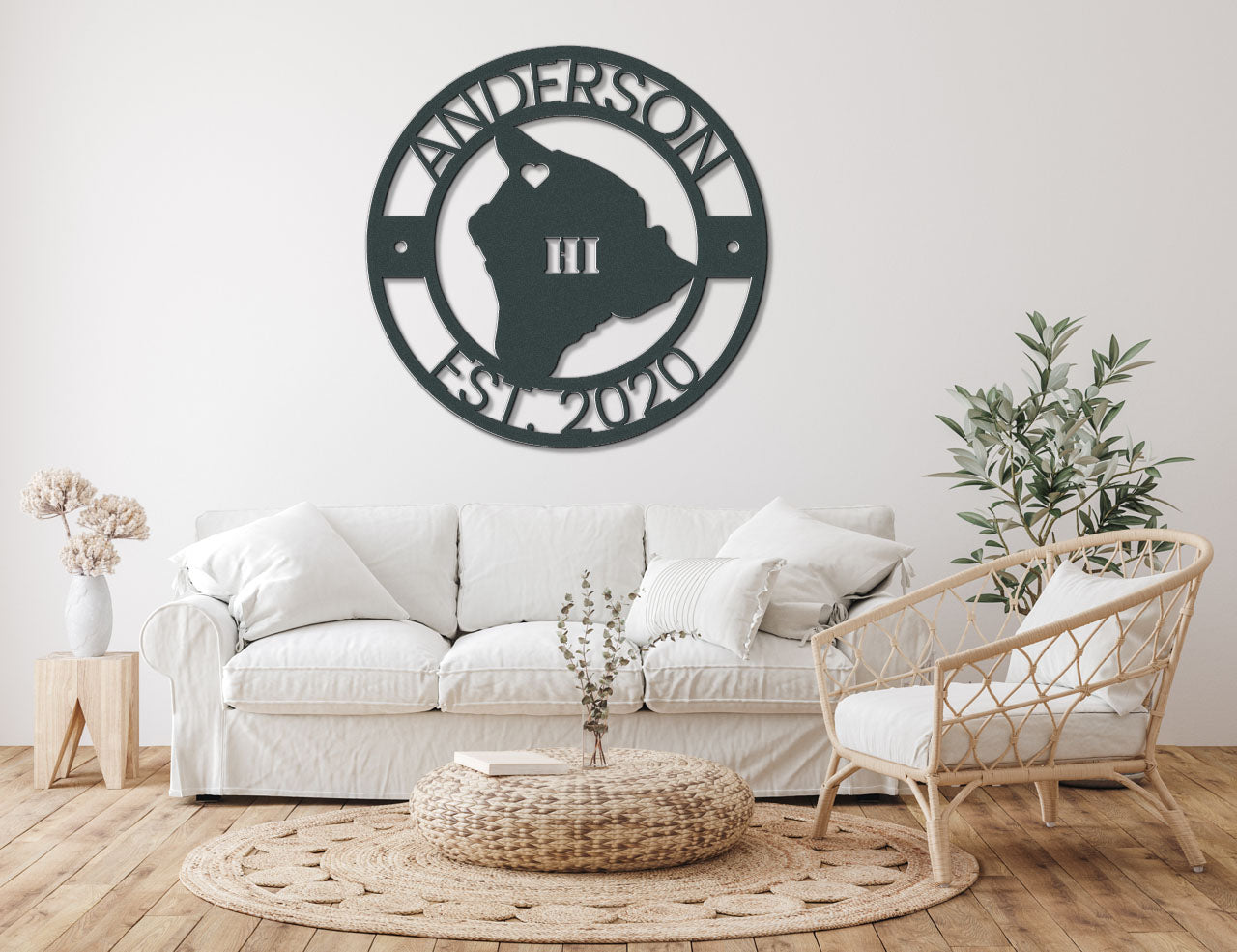 a living room with a white couch and white chairs