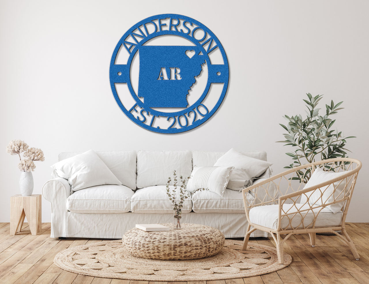 a living room with a white couch and white chairs