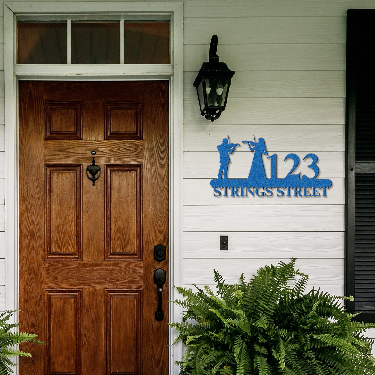 a wooden door with a sign that says 1213 strings street