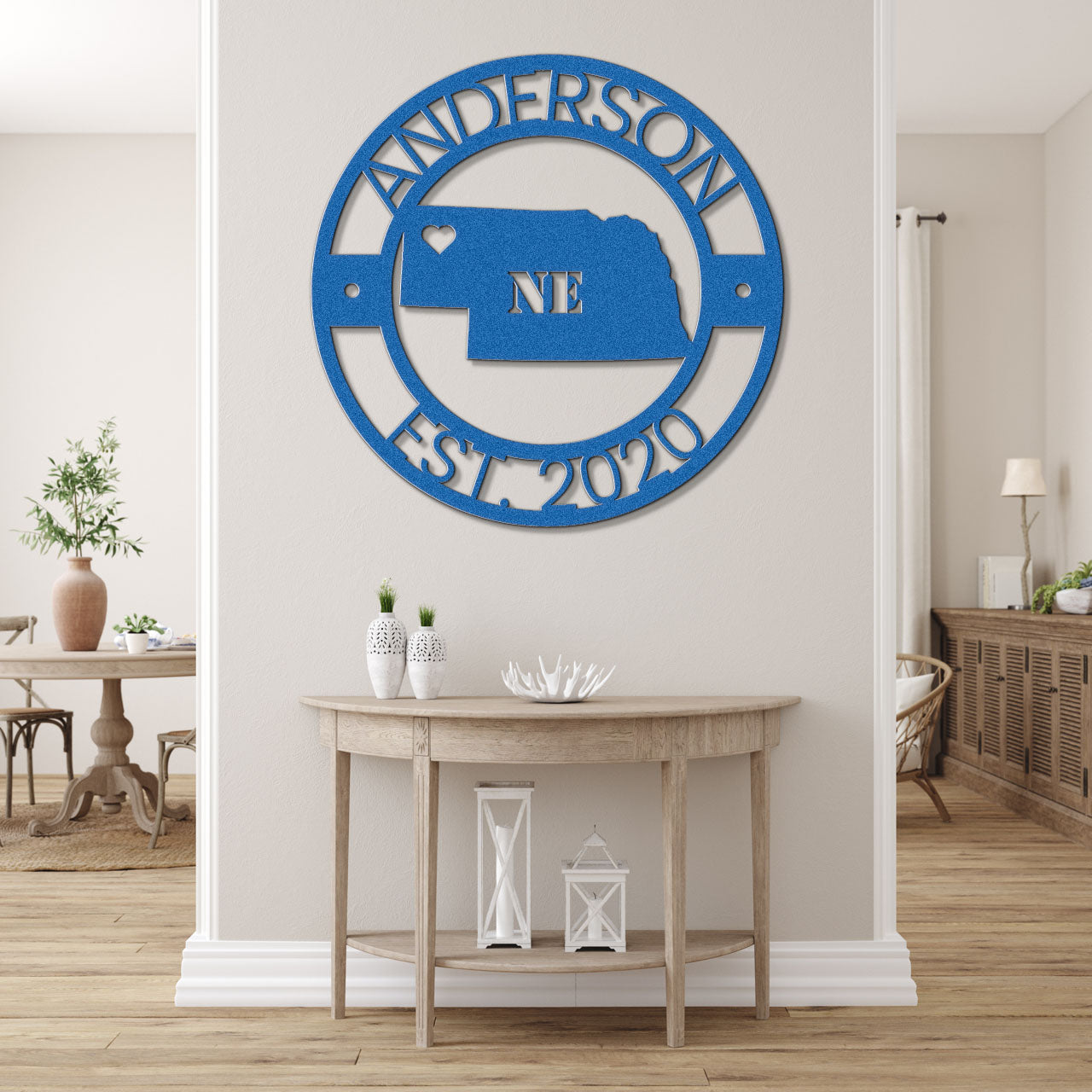 a blue and white sign on the wall of a living room