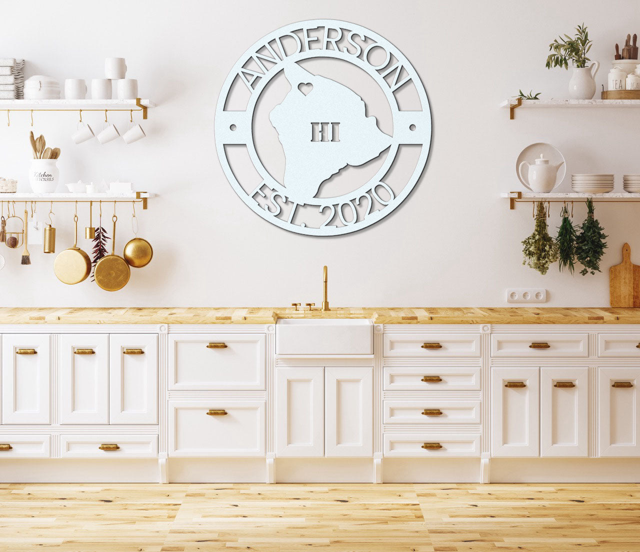 a kitchen with white cabinets and a white clock on the wall