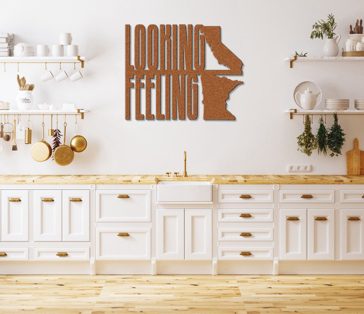 a kitchen with white cabinets and a cutting board on the wall