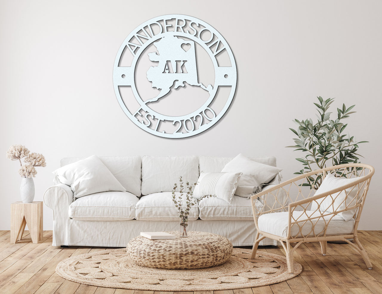 a living room with a white couch and chair