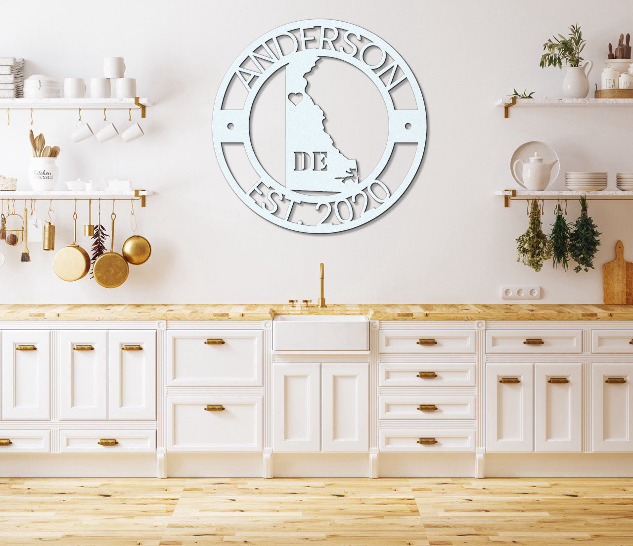 a kitchen with white cabinets and a clock on the wall