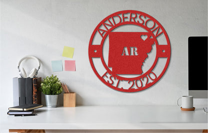 a red metal sign on a white wall