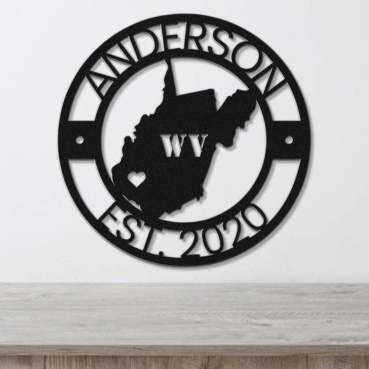 a metal wall clock with the state of west virginia on it