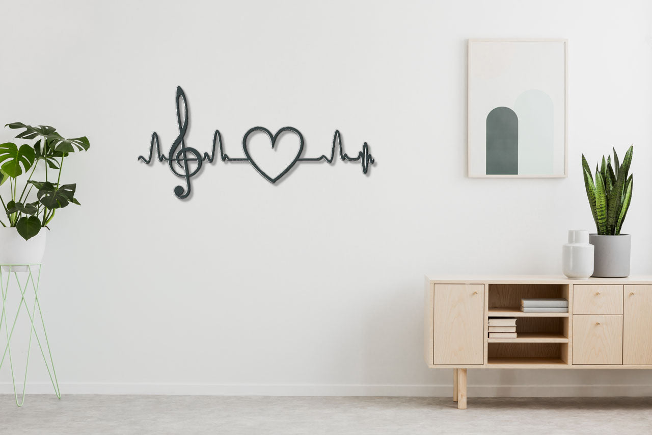 a white room with a plant and a heartbeat sign on the wall