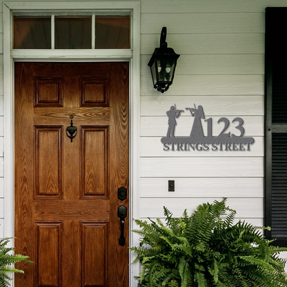 a wooden door with a sign that says 1213 strings street