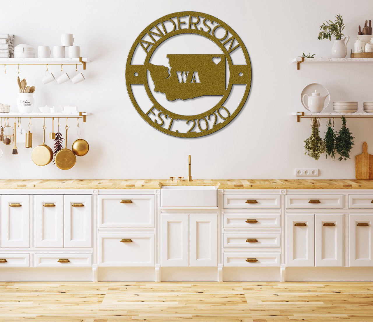 a kitchen with white cabinets and wooden floors