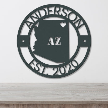 a metal sign with the name and state of arizona on it