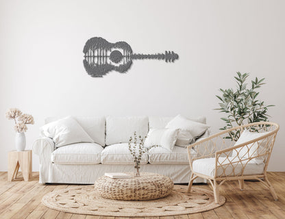 a living room with a white couch and a guitar wall decal