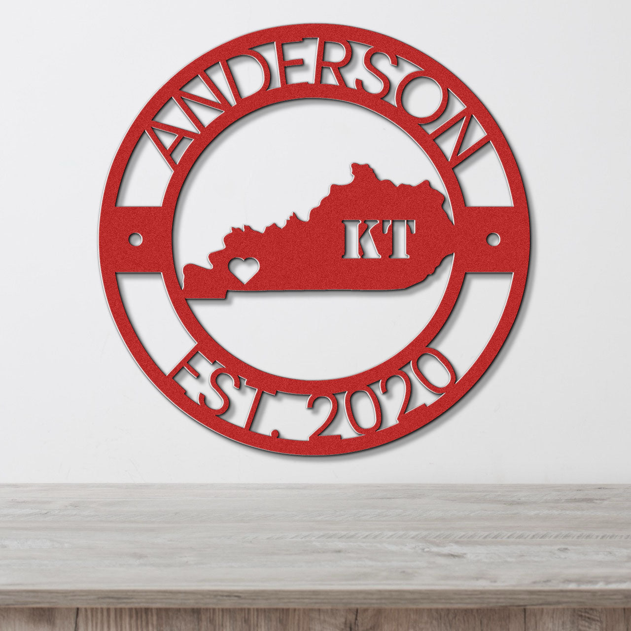 a red metal sign that says anderson est 2010