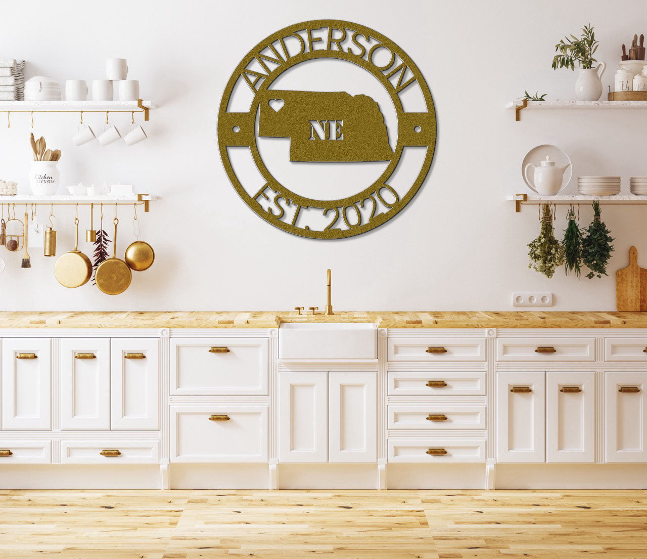 a kitchen with white cabinets and a metal clock