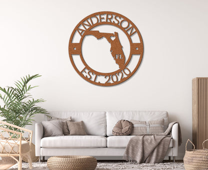 a living room with a white couch and a wooden clock