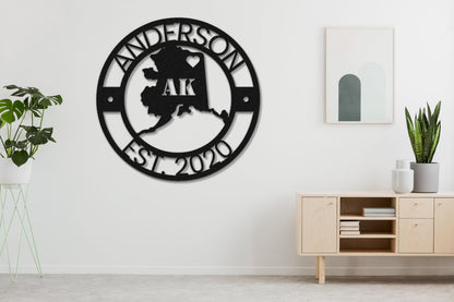 a black and white clock on a white wall