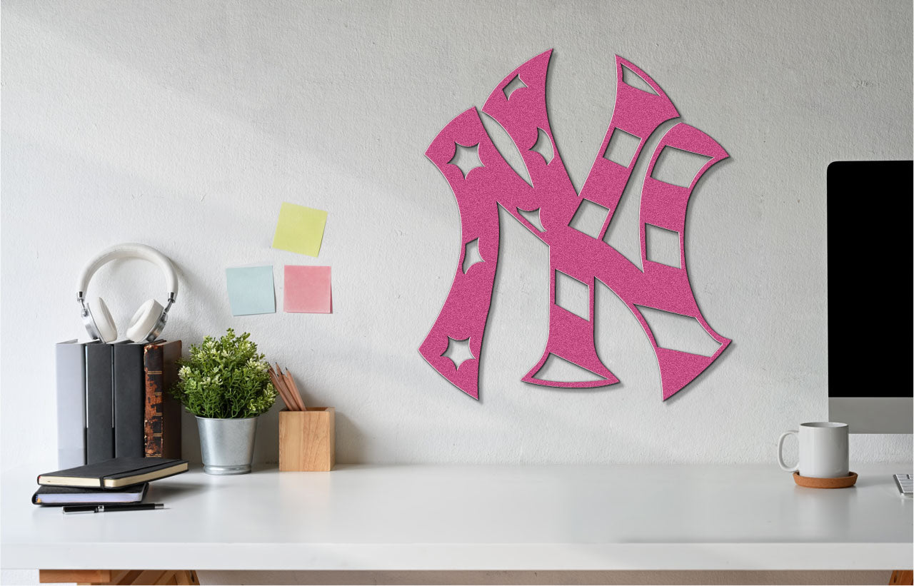 a wall clock with a pink baseball cap on it