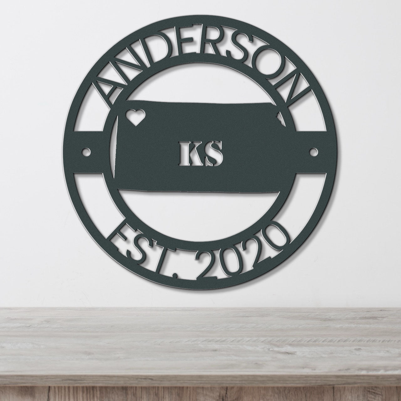 a metal sign that says andersonsville est 2010