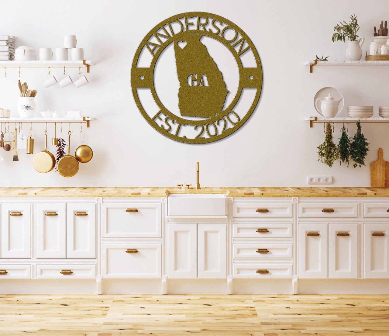 a kitchen with white cabinets and wooden floors