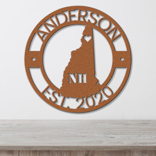 a personalized metal wall clock with the state of new hampshire