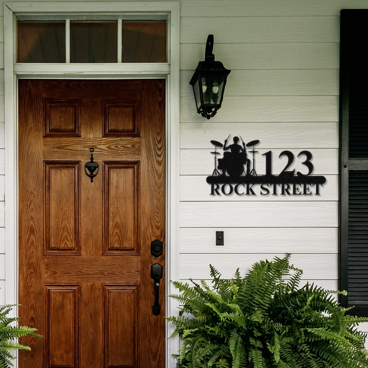 a wooden door with a rock street sign on it