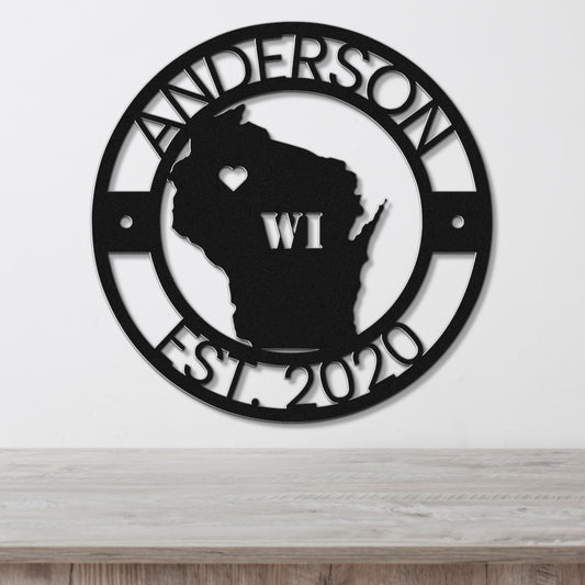 a metal sign with the state of wisconsin on it